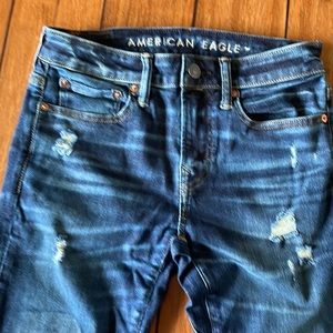 American Eagle Airflex 360 jeans with patched holes.  Only worn twice.